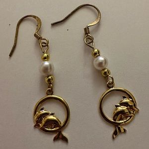 Gold dolphin earrings - from Bahamas
